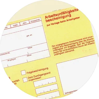 Symbolbild: Formular "Arbeitsunfähigkeitsbescheinigung" zur Vorlage beim Arbeitgeber